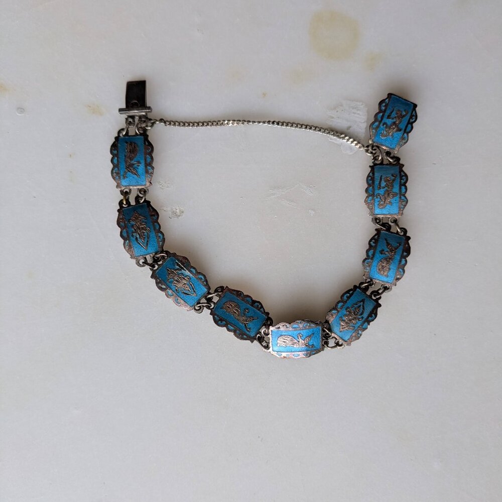 Siam Bracelet with Blue Background 9 Dancers